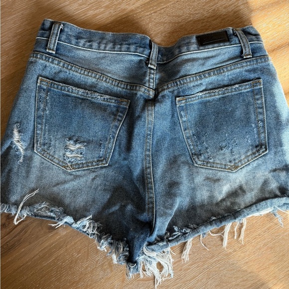 Chic Blue Distressed Denim Shorts - Picture 2 of 3